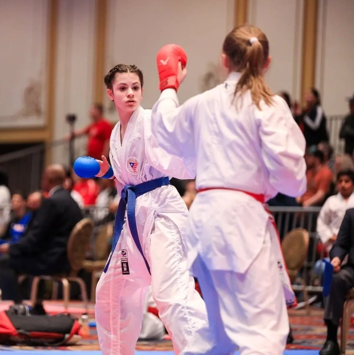 Students practicing karate kata in formation